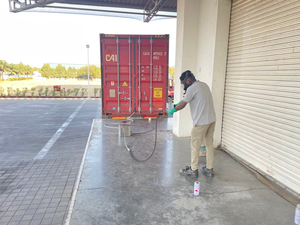 Container fumigation operator
